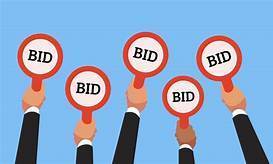 Auction hands with bid signs