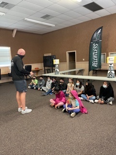 Coach Keilman talking to the 5th graders about middle school athletics