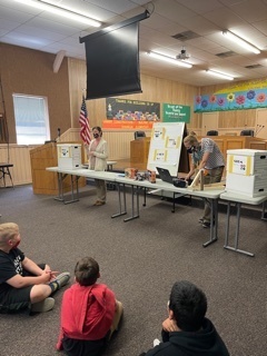 5th graders listening to the presenters