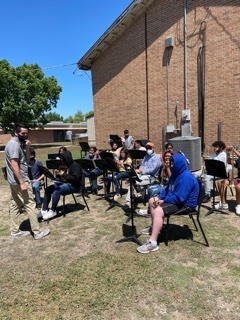 Band students playing for the 5th graders
